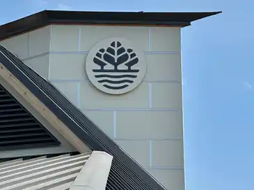 Exterior view of a municipal building project, showcasing durable materials and community-focused architecture.